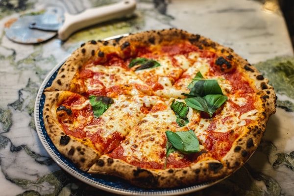 Pizza Margherita recipe — classic Neapolitan with tomato and mozzarella